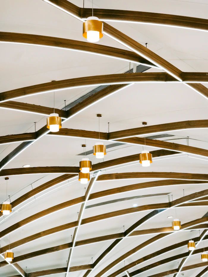 Stylish pendant lighting over a dining table.