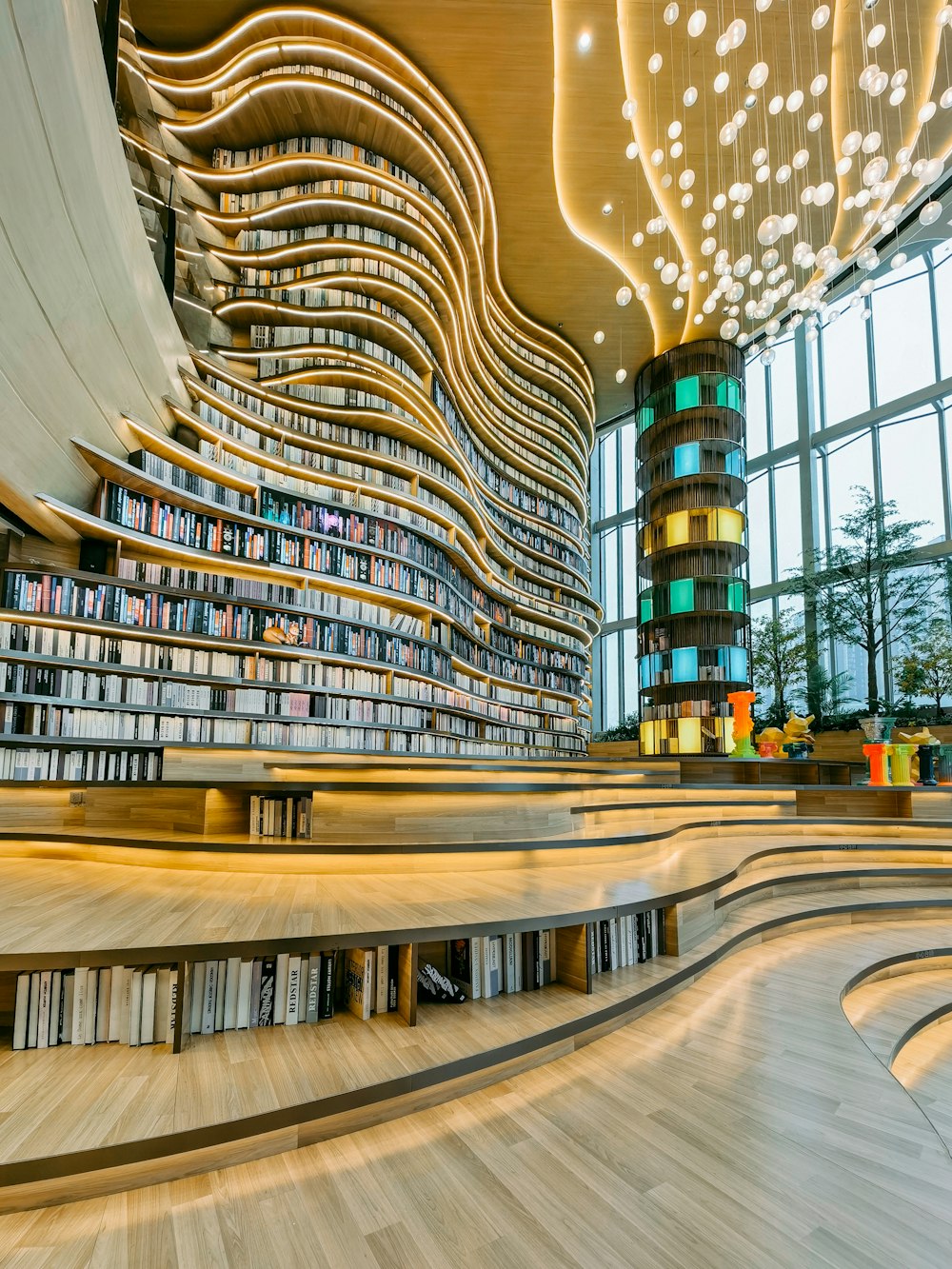 a large room with a lot of books on the shelves