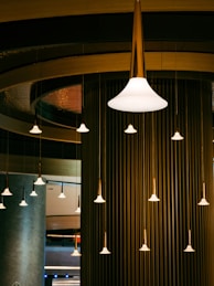 a group of lights that are hanging from a ceiling