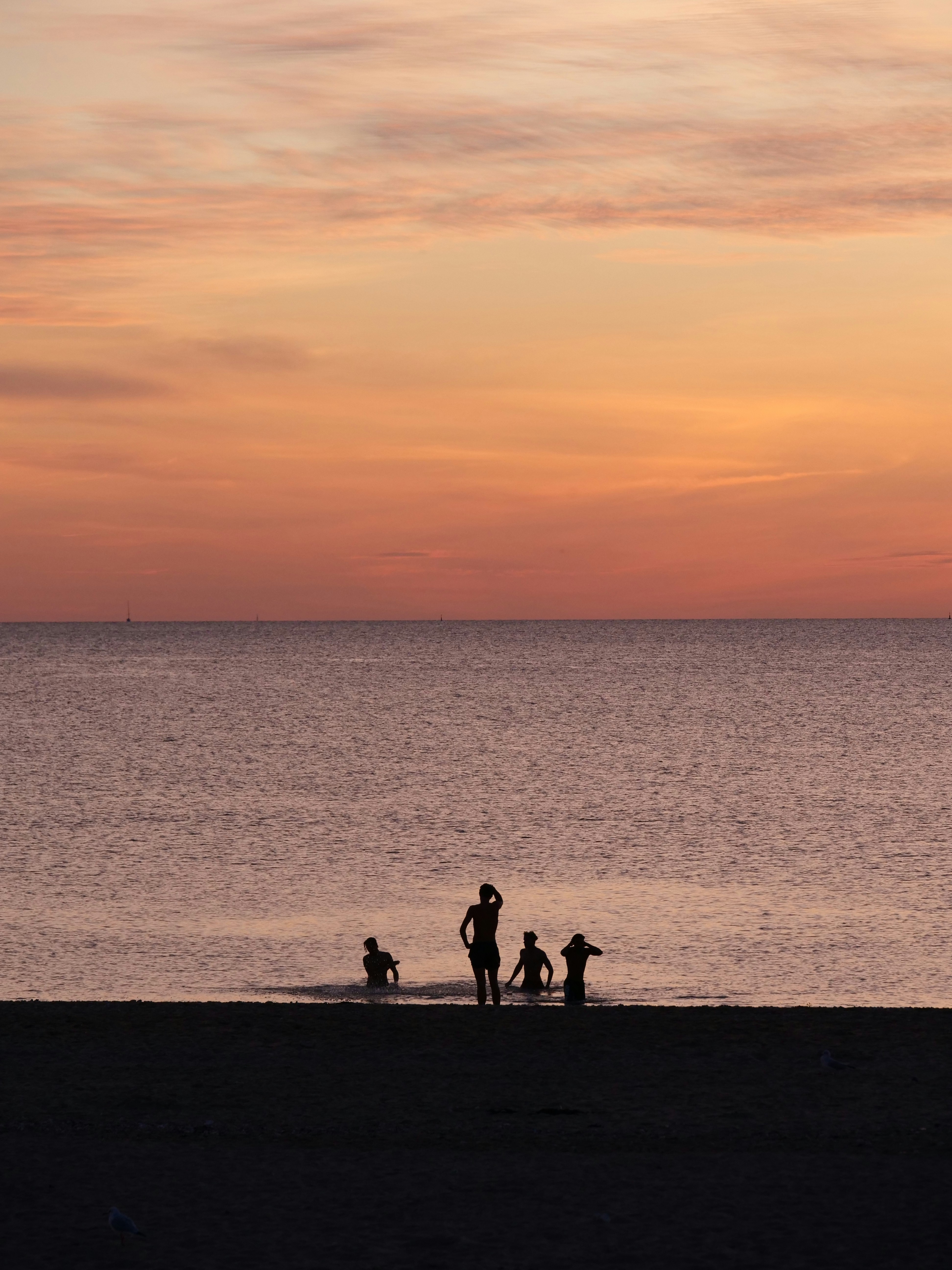 woman wearing yellow long-sleeved dress under white clouds and blue sky during daytime