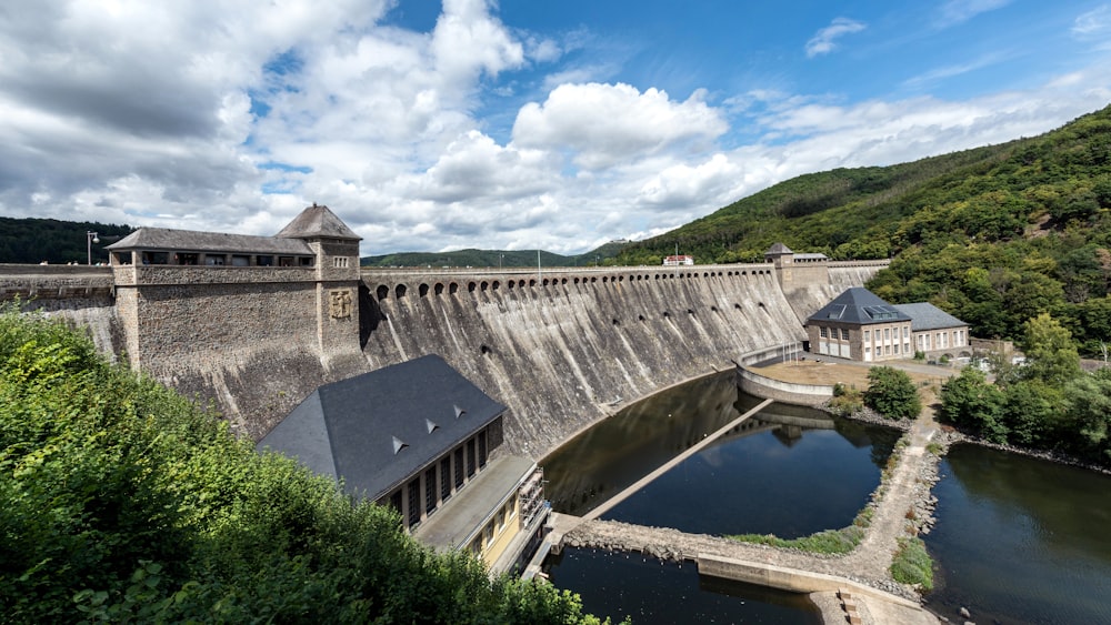 a view of a dam with a river running through it