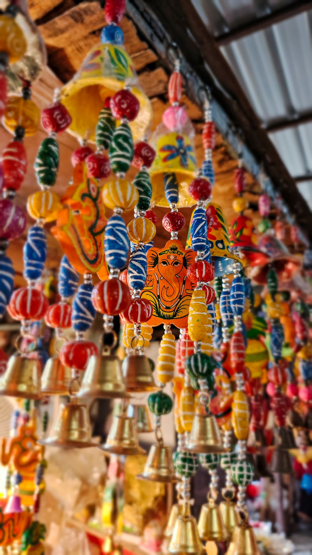 a bunch of colorful lights hanging from a ceiling