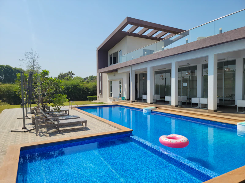 Luxury poolside villa with sun loungers