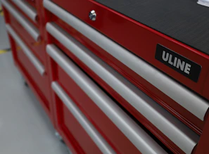 a close up of a red tool box