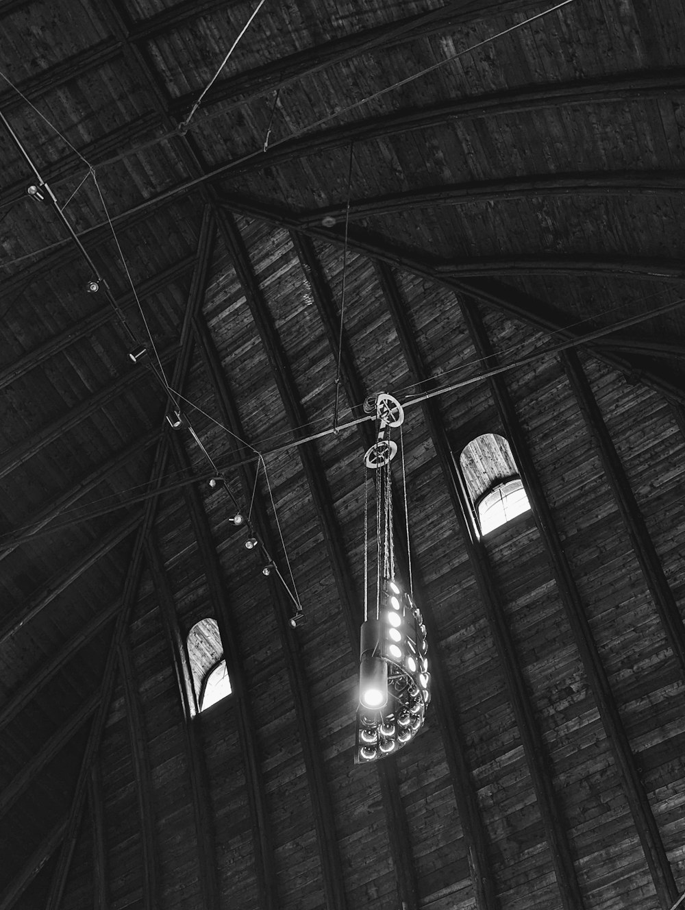 a chandelier hanging from the ceiling of a building