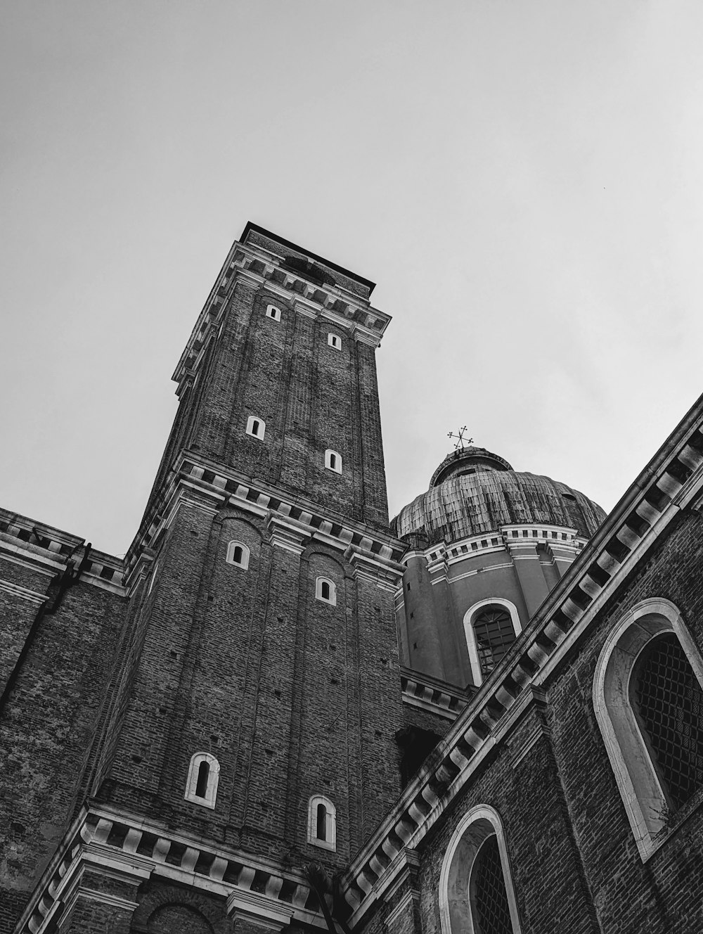 a black and white photo of a tall building