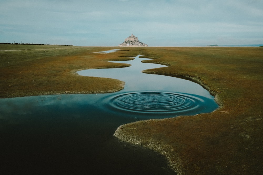 a large body of water surrounded by land