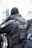 a police officer talking on a cell phone