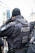 a police officer talking on a cell phone