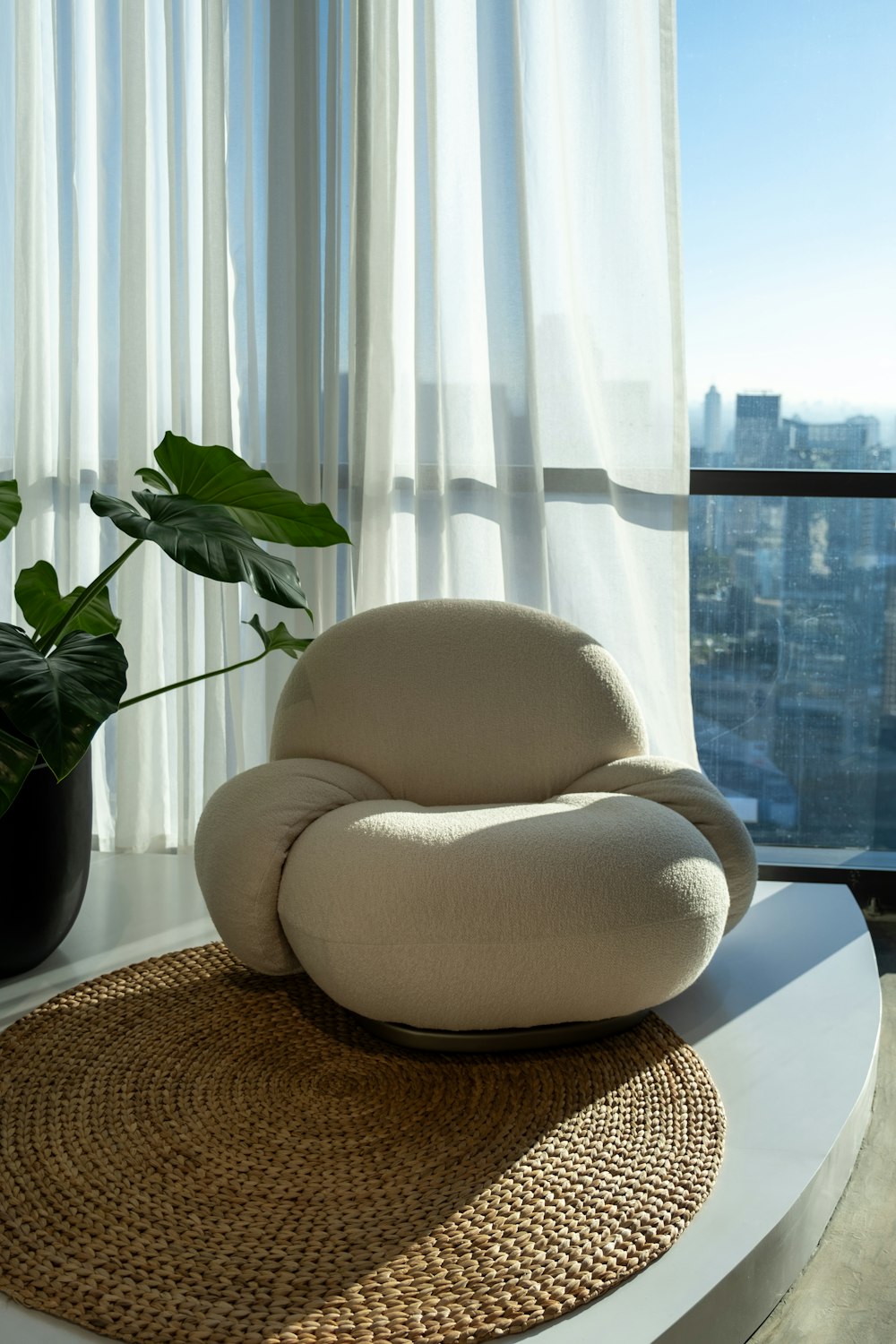 a chair sitting on top of a table next to a window