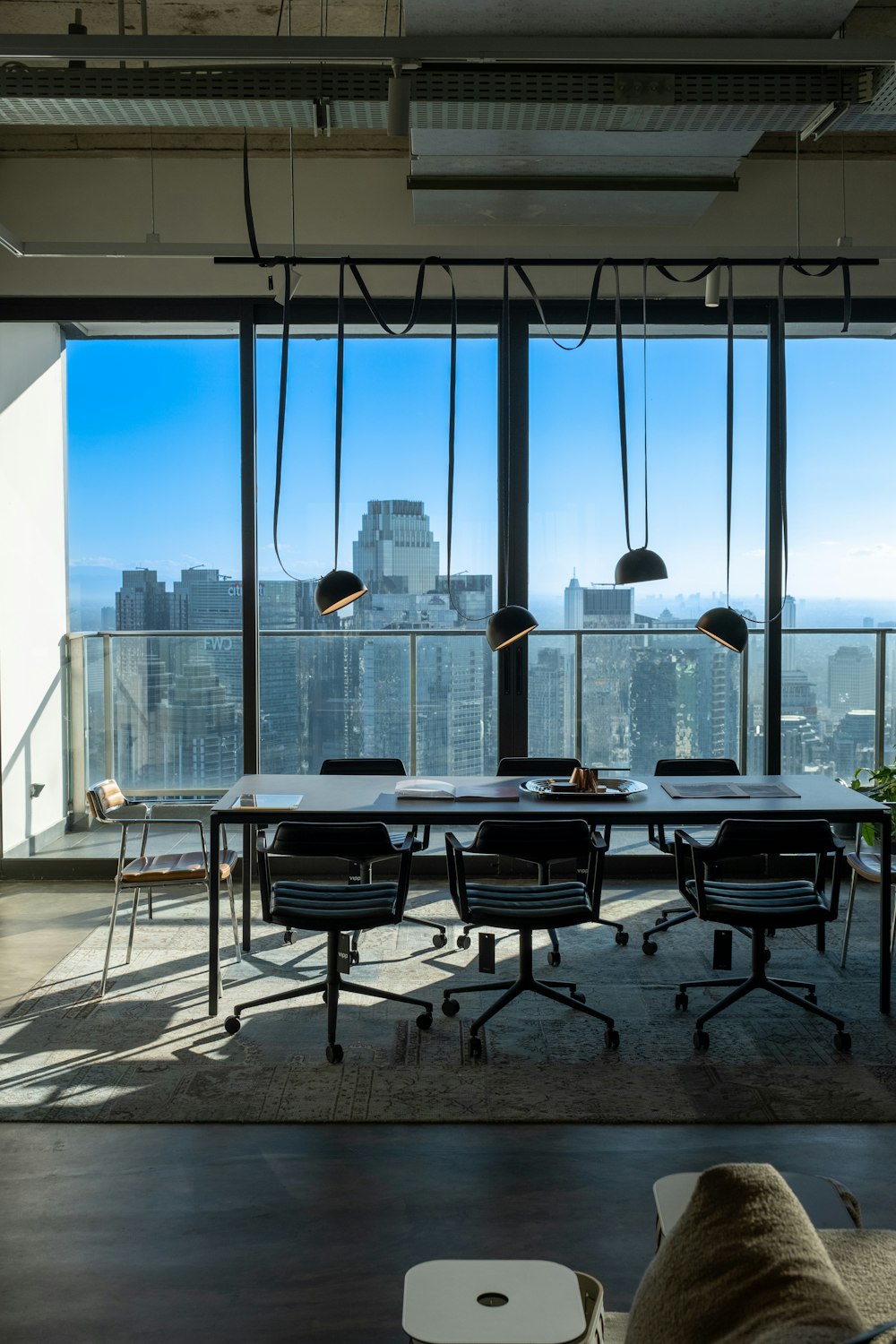 a conference room with a view of the city