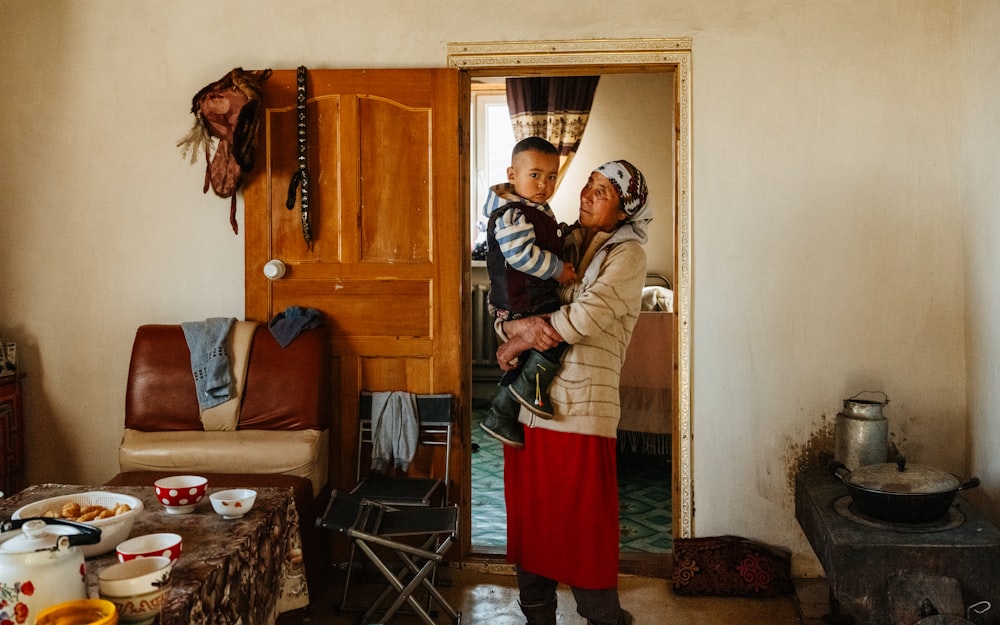 a man and a woman standing in a doorway