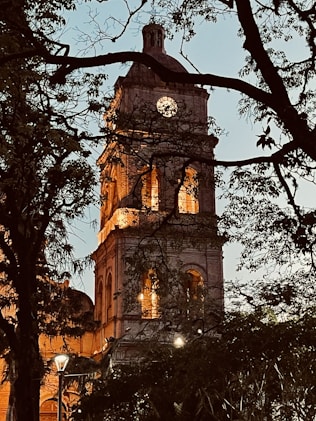 a tall tower with a clock at the top of it