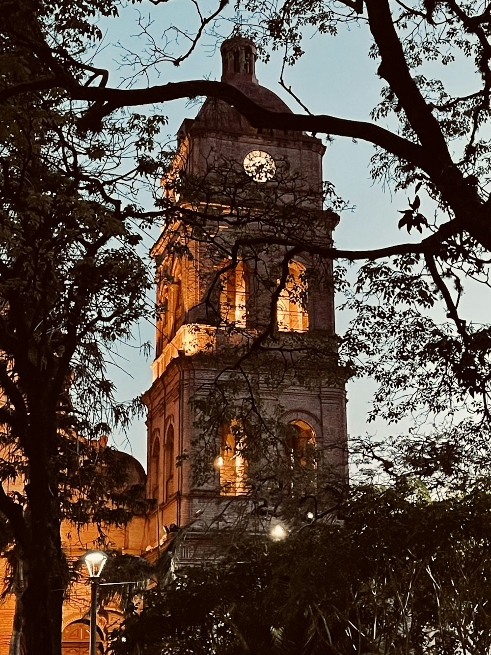 a tall tower with a clock at the top of it