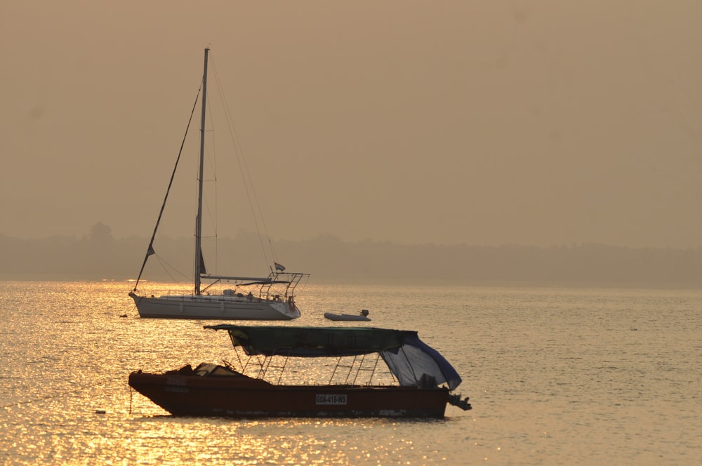 a boat floating on top of a body of water