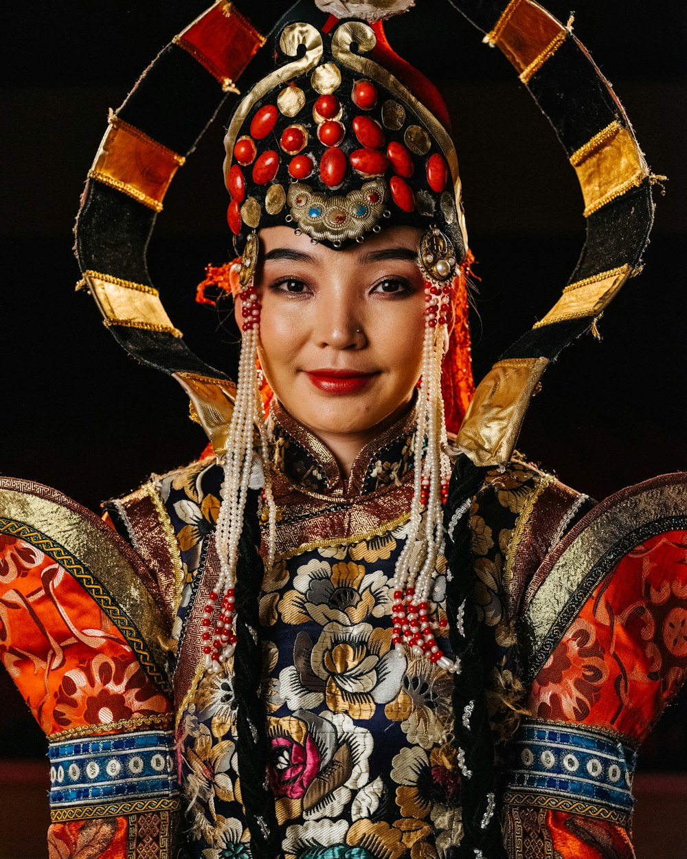 a woman dressed in a costume and headdress