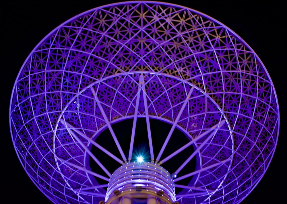 a very large structure that is lit up at night