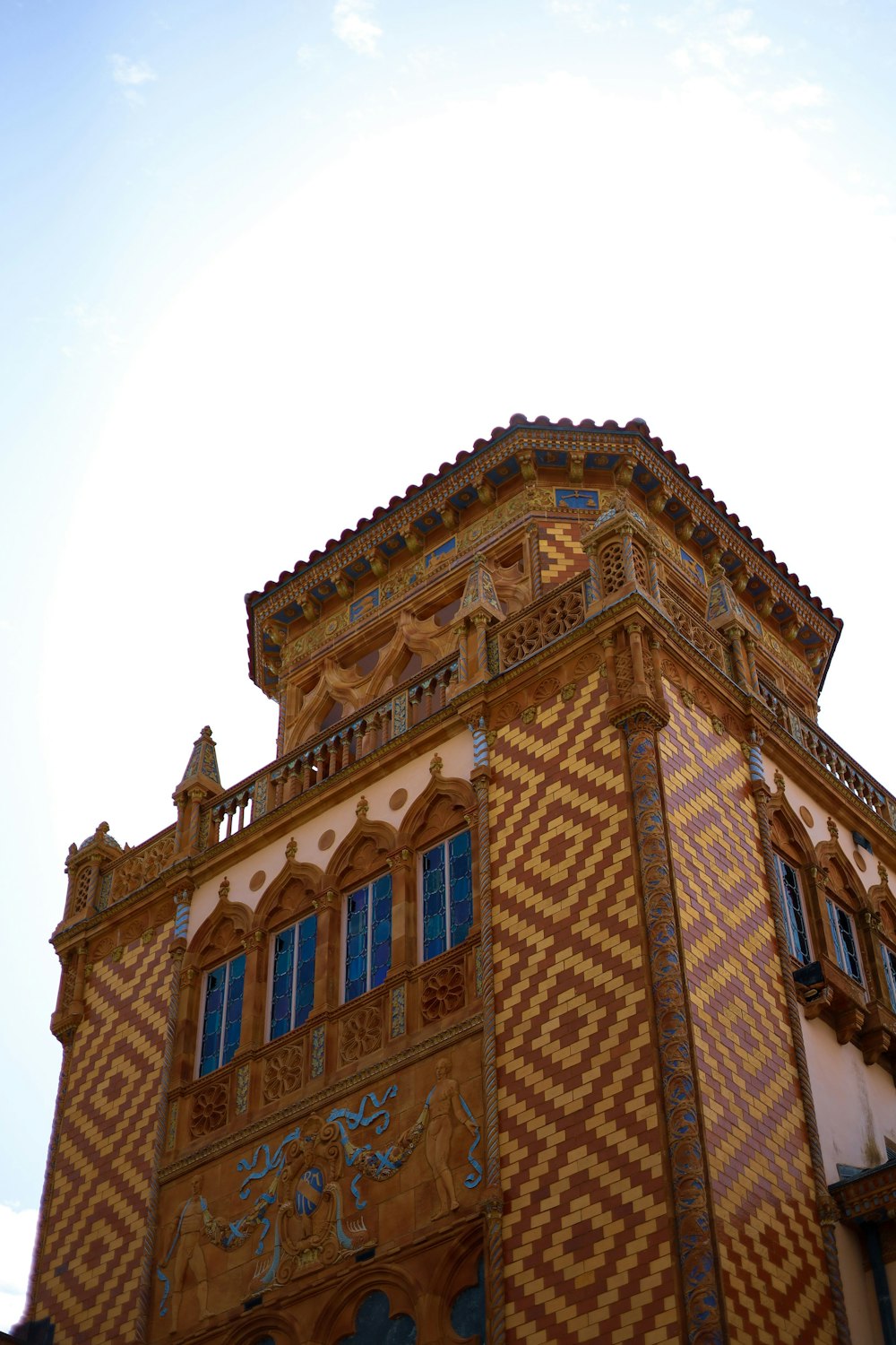 a tall building with a clock on the top of it