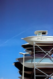 a large white boat sitting on top of a dock