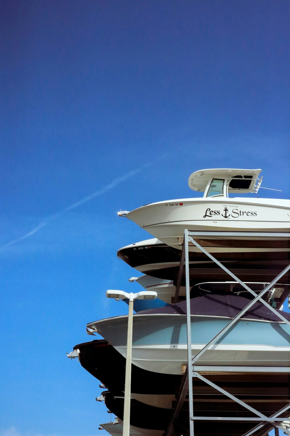 a large white boat sitting on top of a dock