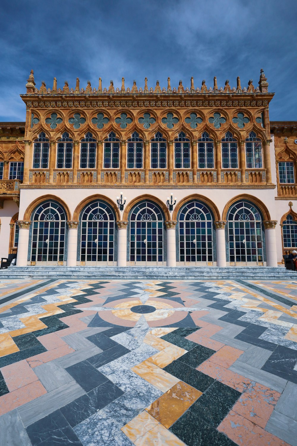 a large building with many windows and a checkered floor