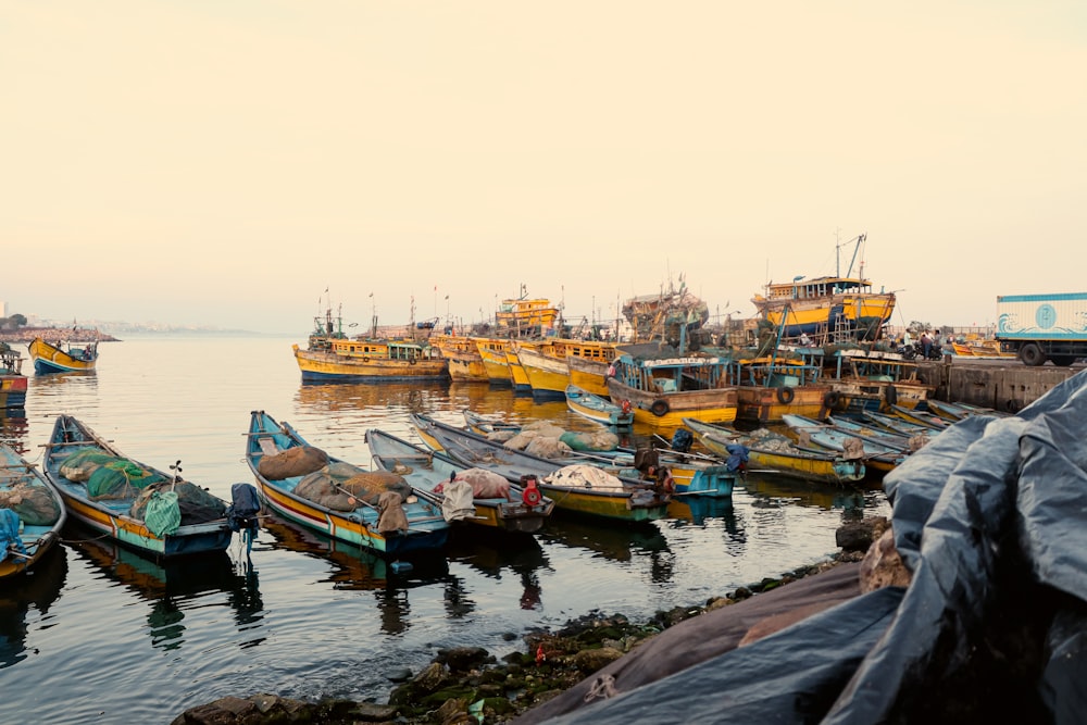 a bunch of boats that are sitting in the water