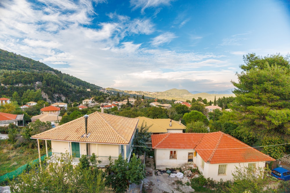 an aerial view of a house in the mountains