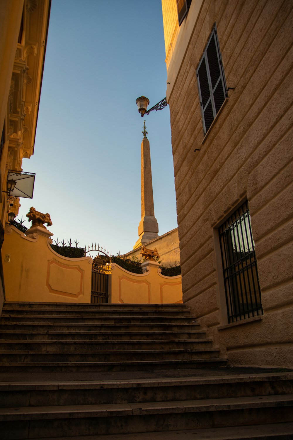 a view of a building from the bottom of some stairs