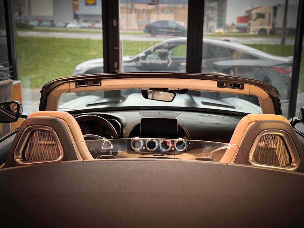 a view of a car from inside a vehicle
