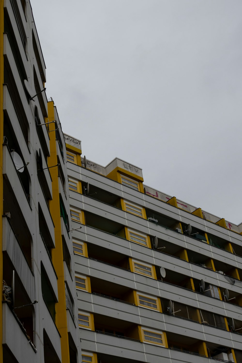 a tall building with a clock on the side of it