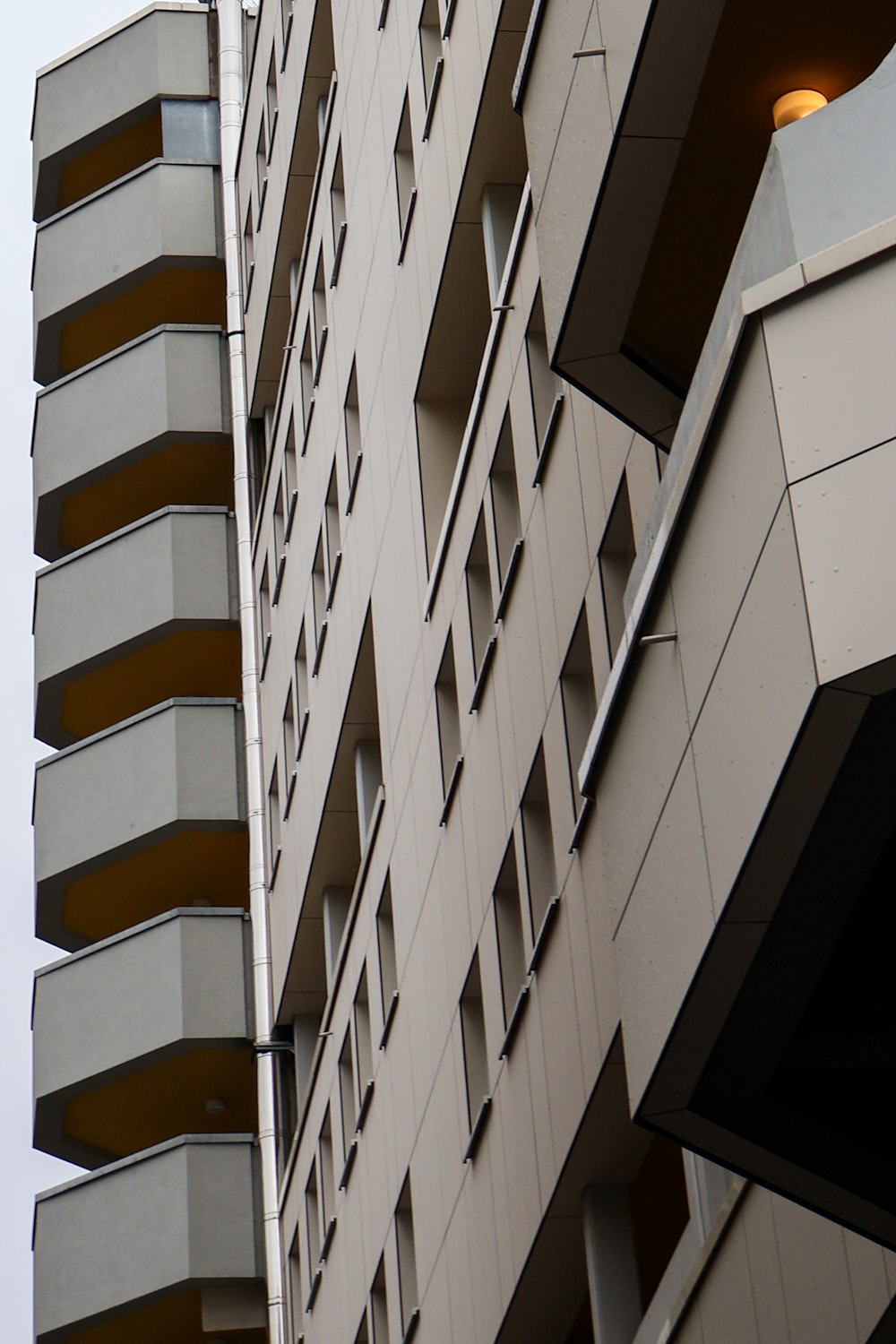 a tall building with a clock on the side of it