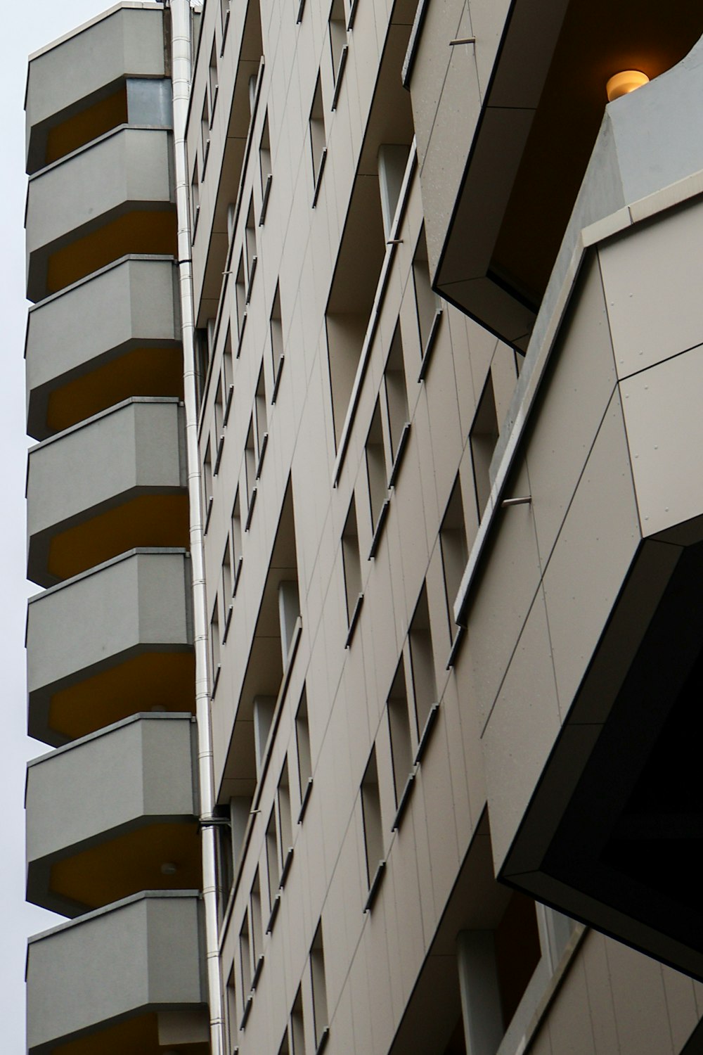 a tall building with a clock on the side of it