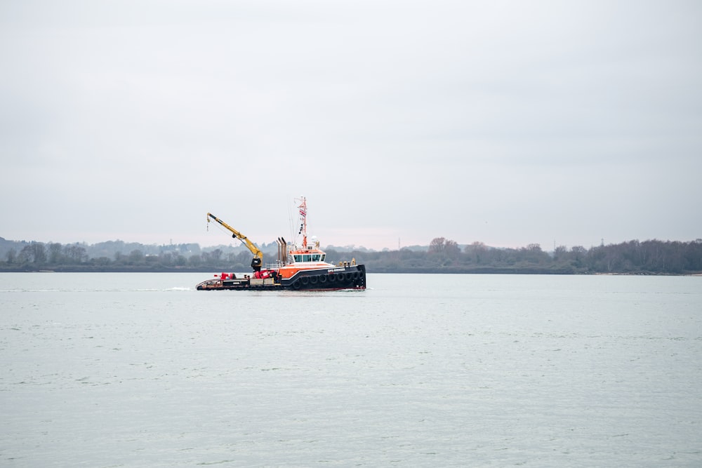 a large boat floating on top of a large body of water