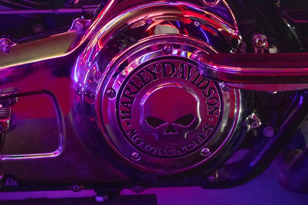 a close up of a motorcycle with a skull on it