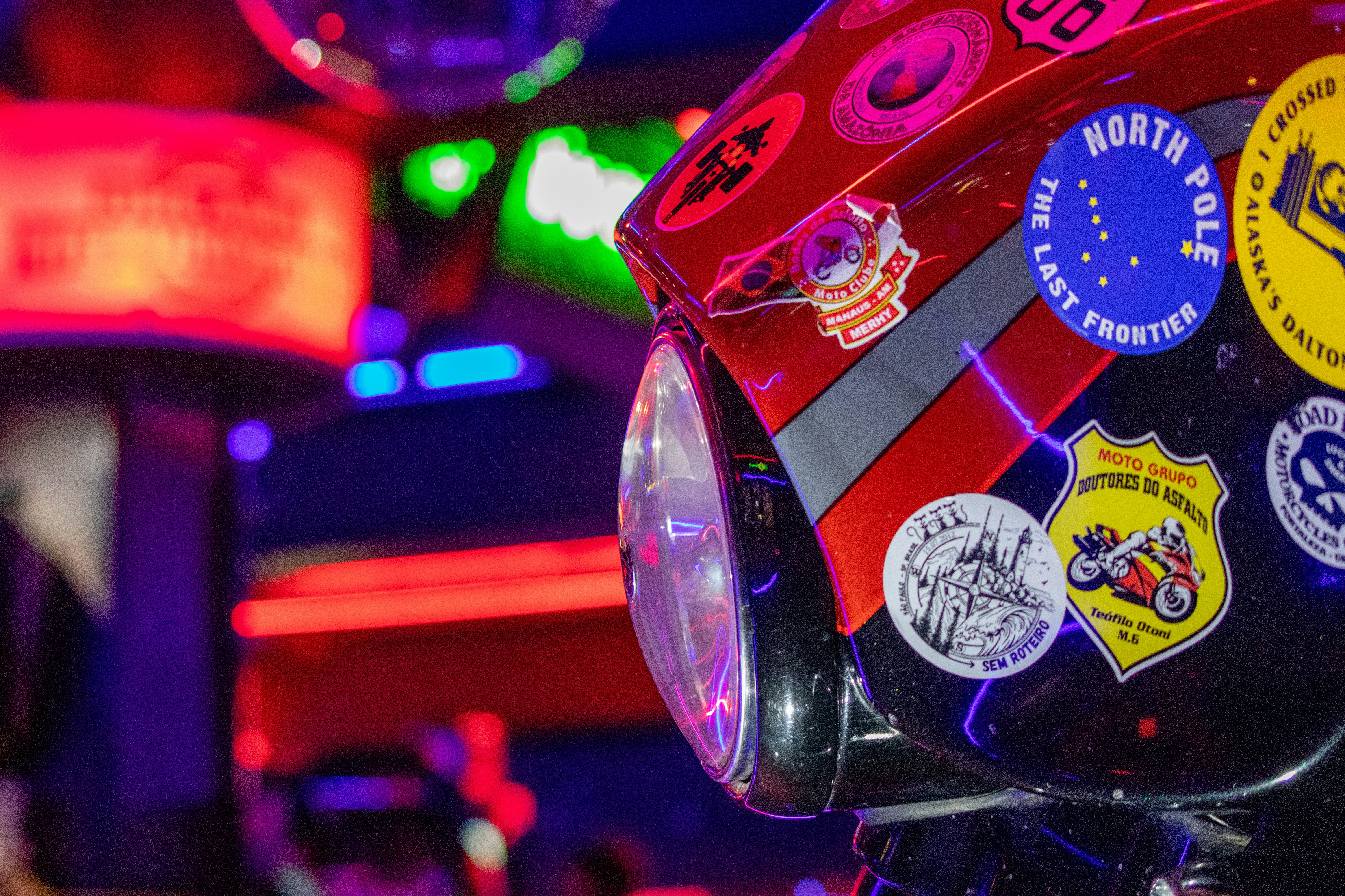 a close up of a light with a lot of stickers on it