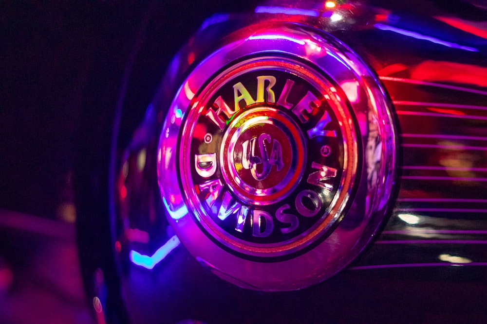 a close up of a car emblem on a car