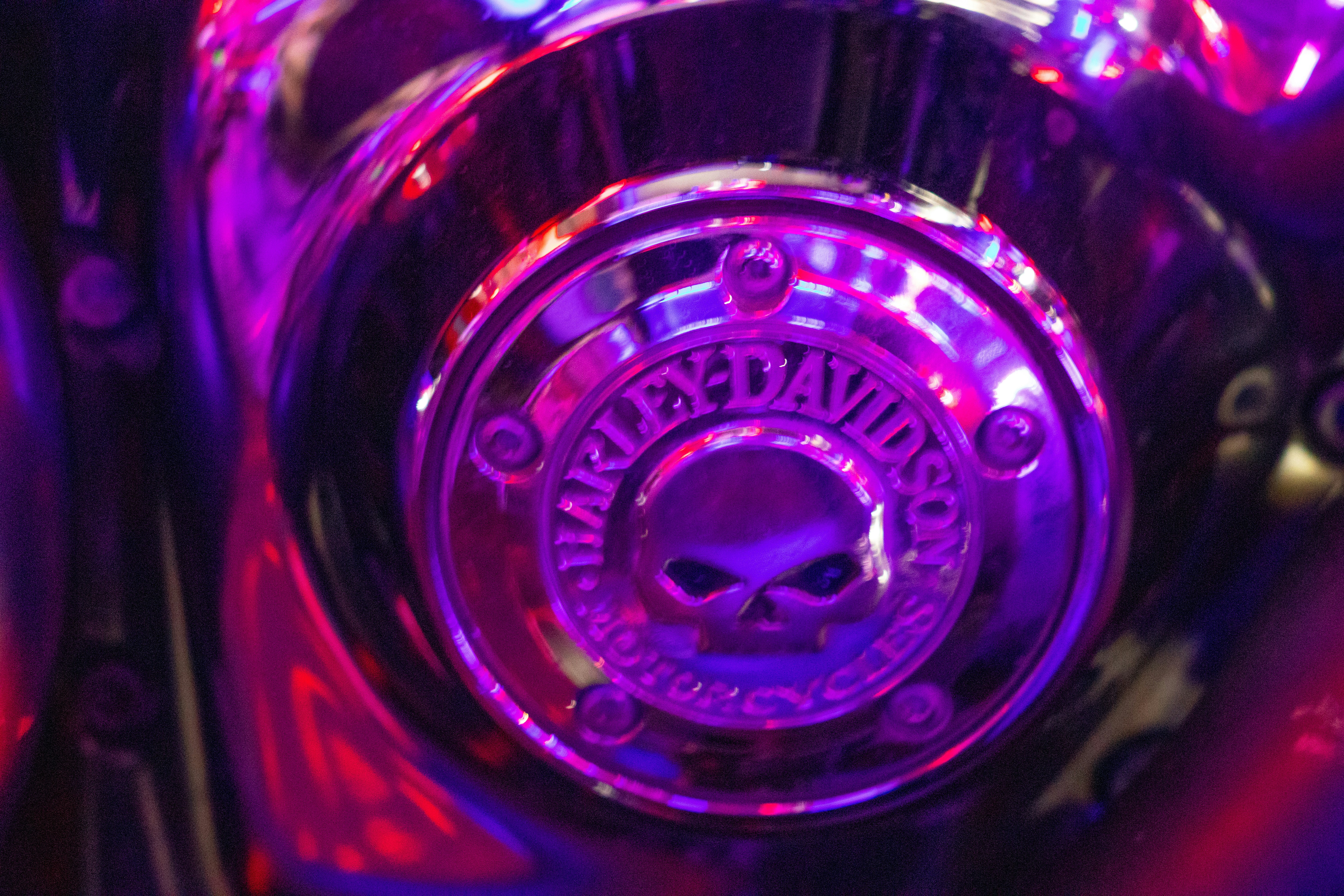 a close up of a purple motorcycle engine