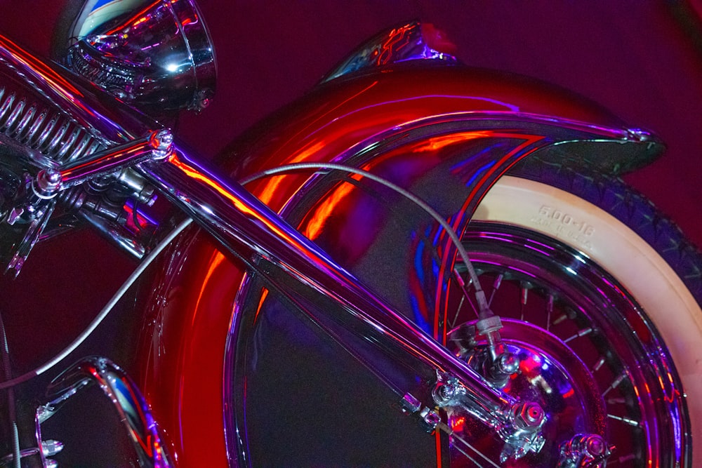 a close up of a motorcycle with a red light