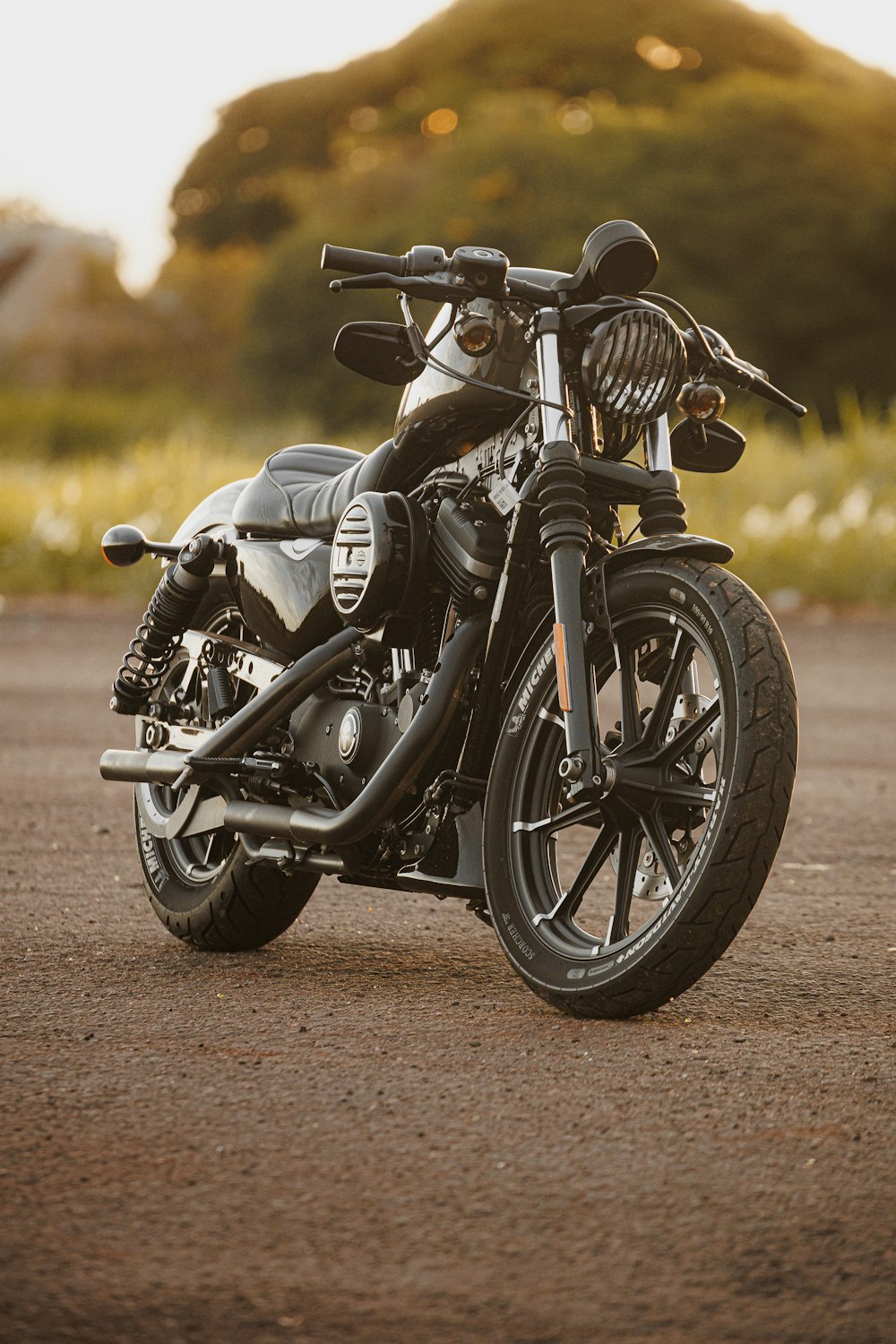 a motorcycle parked on the side of a road