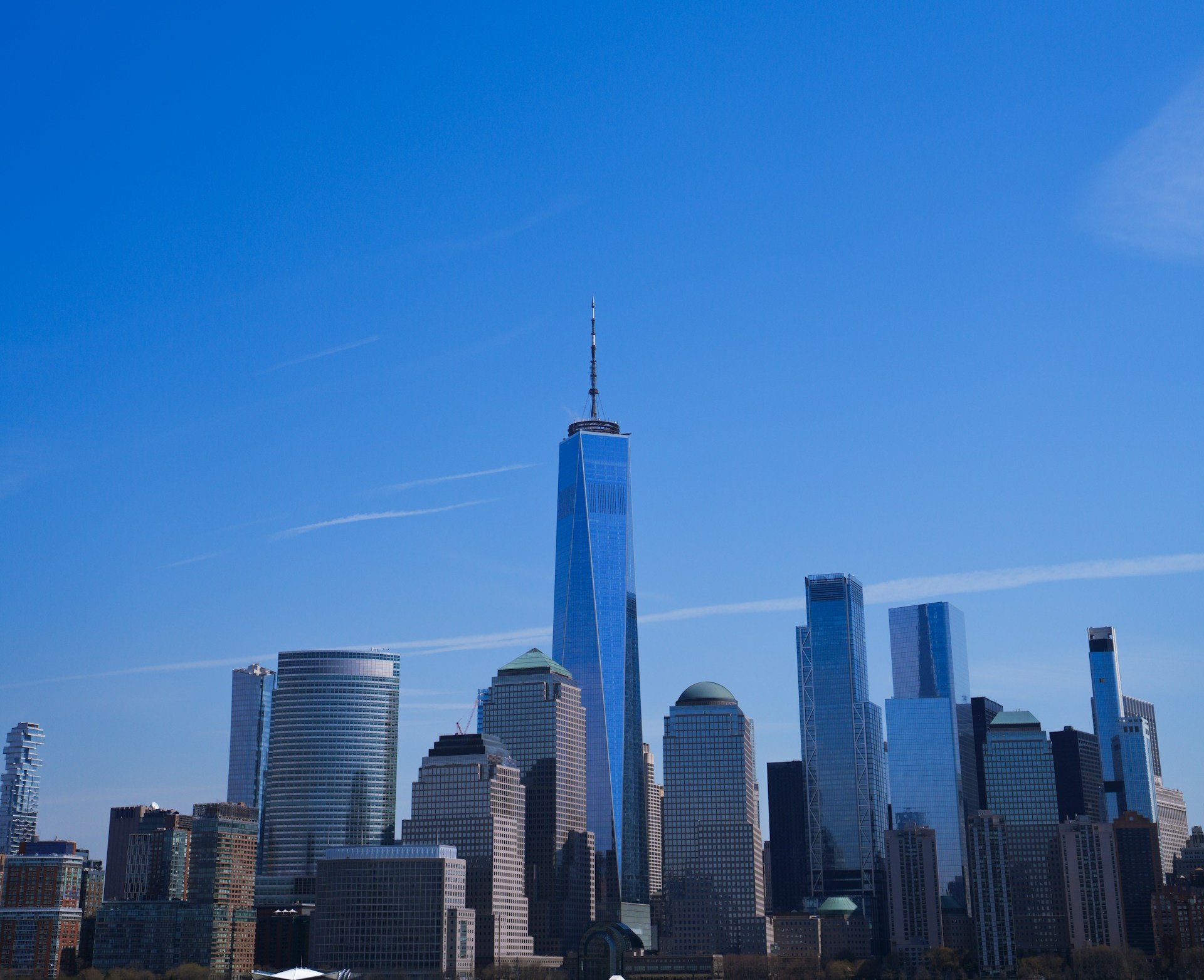 a view of a city with tall buildings