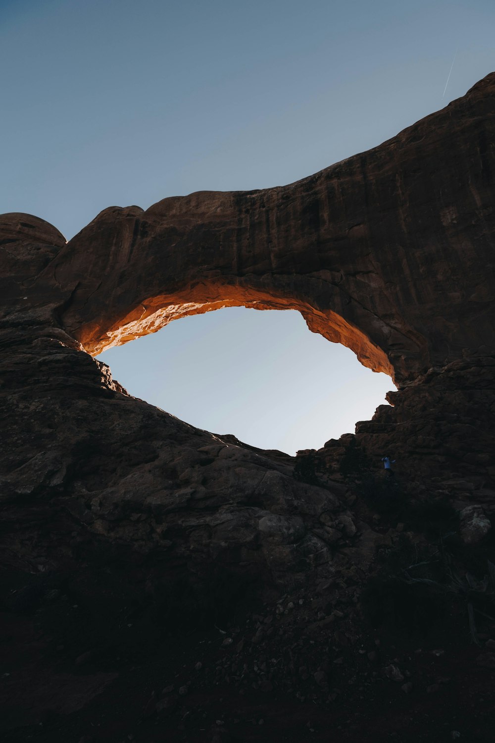 a large rock formation with a hole in the middle