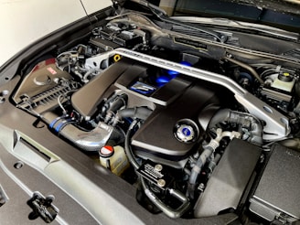 the engine compartment of a car with its hood open