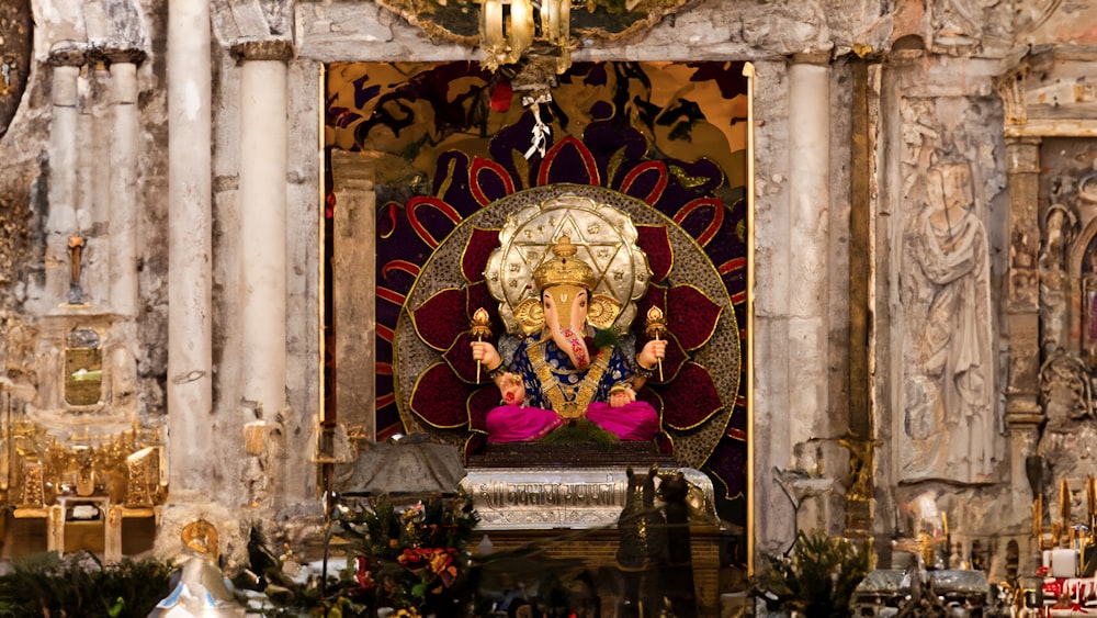 a statue of an elephant in a church