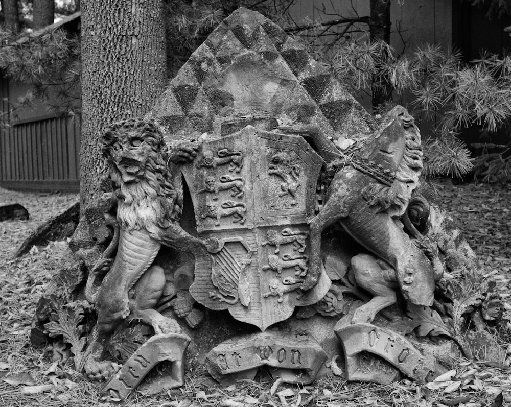 a black and white photo of a statue