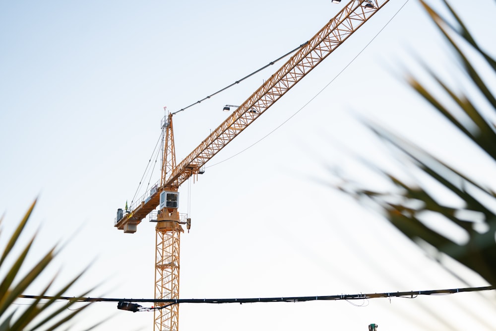 a crane that is sitting on top of a pole