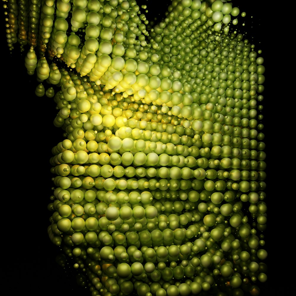 a close up of a bunch of green apples