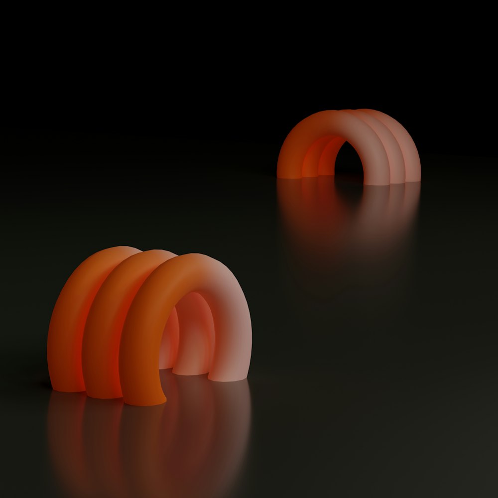 a couple of orange objects sitting on top of a table