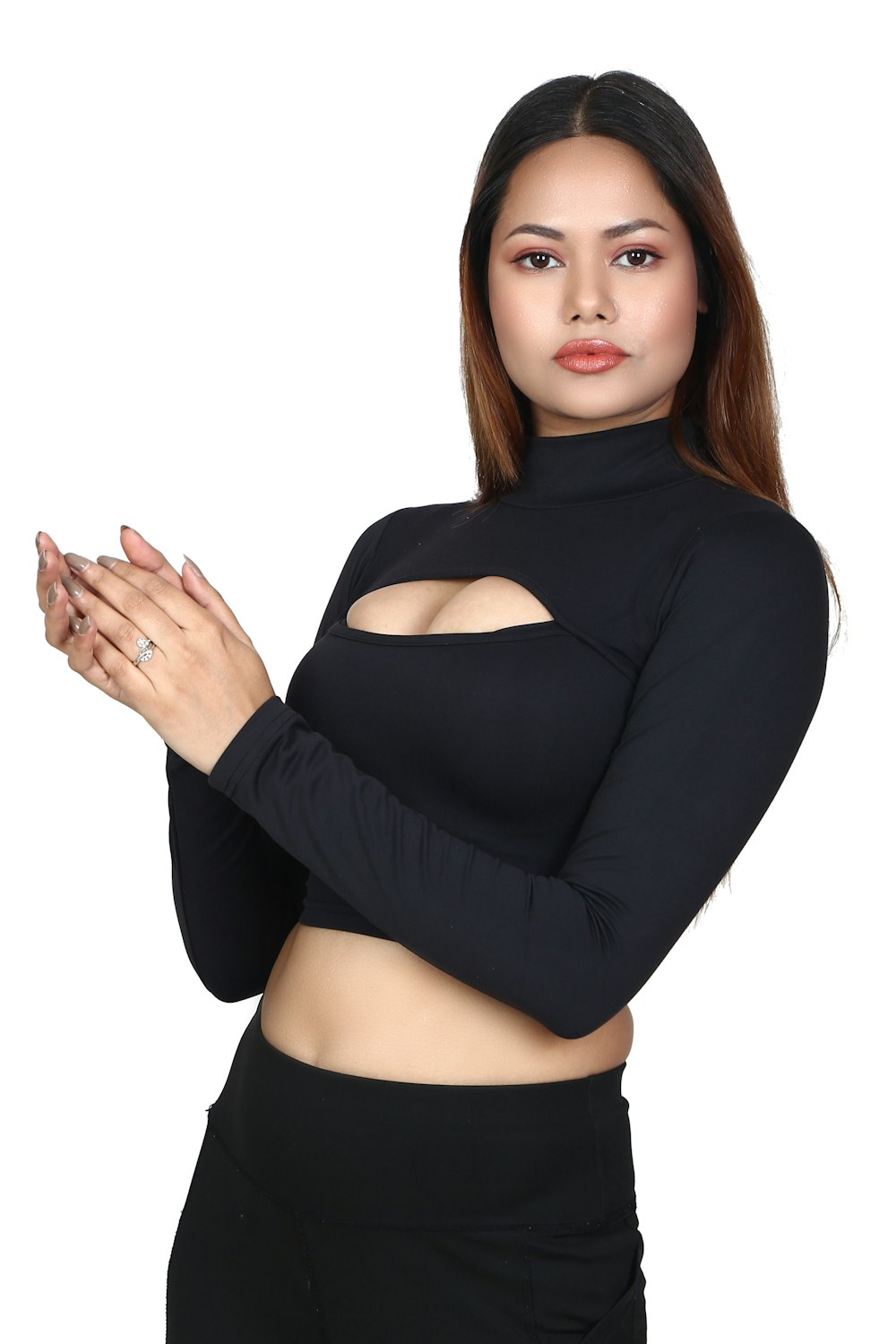 a woman wearing a black top and black pants