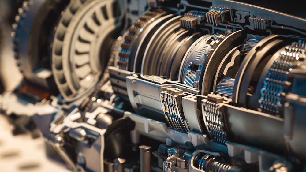 a close up of a machine with many gears