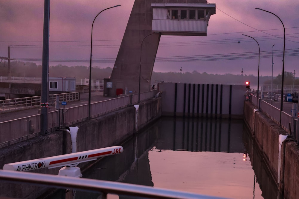 an airplane is parked at the gate of a lock